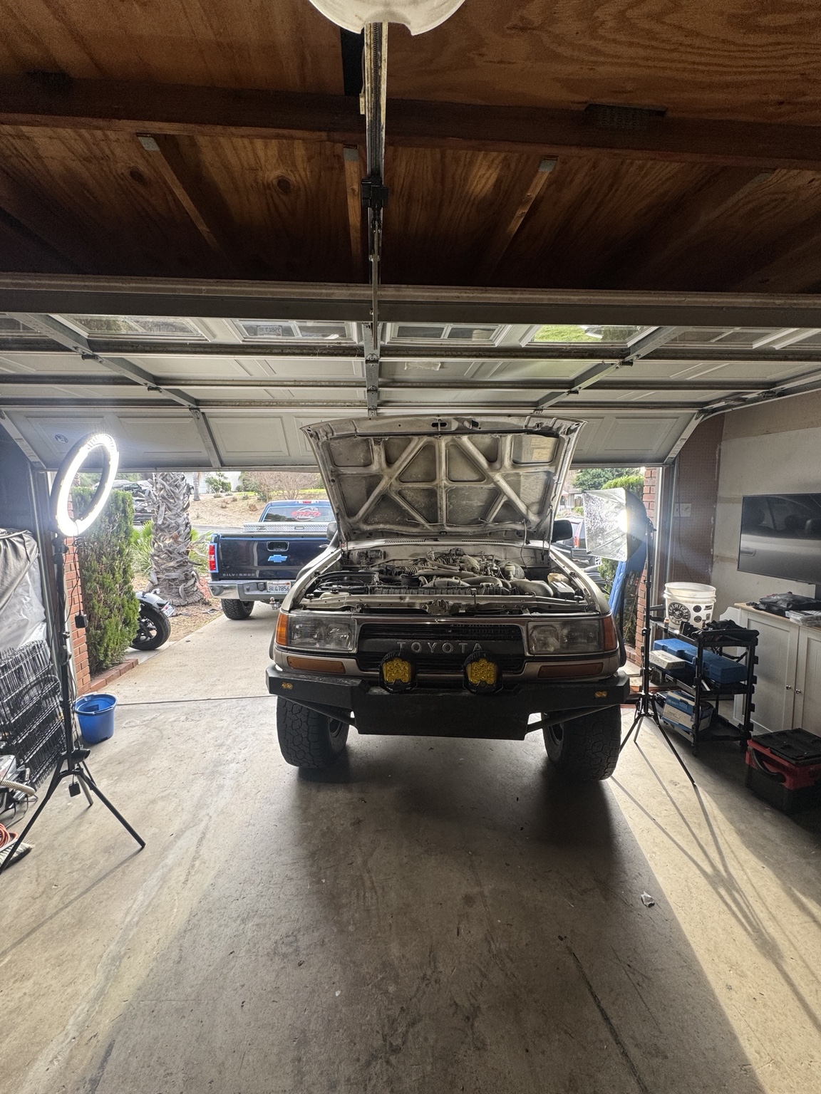Toyota Land Cruiser in a garage for repair
